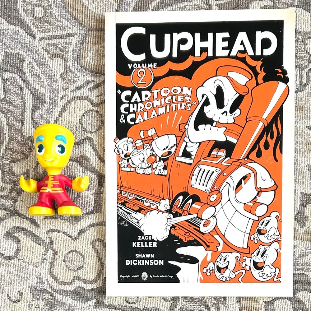 Cuphead Volume 2 Softcover Graphic Novel Comic Book and Figure.